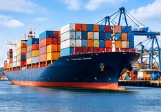 Cargo ship and shipping containers at international port